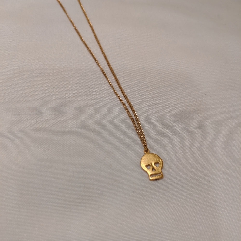 Gold plated skull necklace